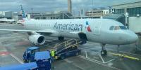 Frustrated Passenger Uses PA System During American Airlines Delay at Chicago O’Hare